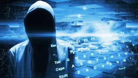 Cybercrime hacker in hood