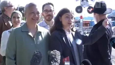 Near miss with train interrupts Greens' level crossing announcement